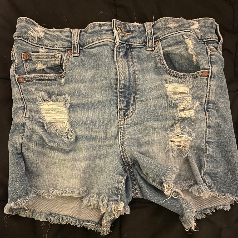 American Eagle Medium Wash High Rise Ripped Shorts.